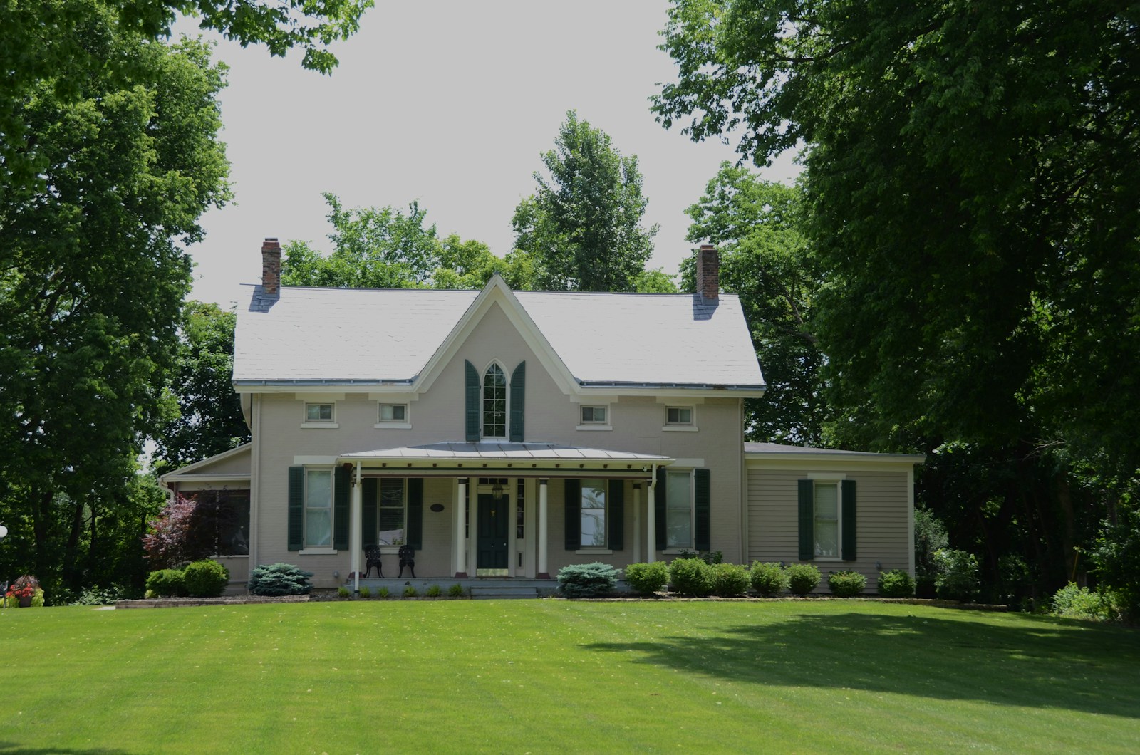 a large white house with a white roof